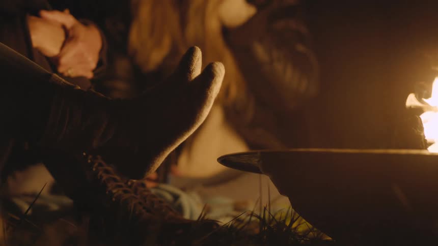 Warming feet by the fire