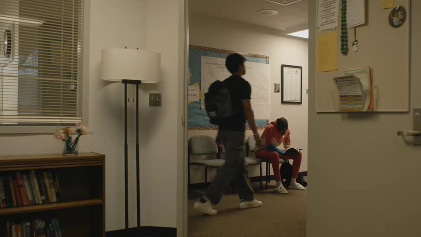 A view of a person sitting in a waiting area