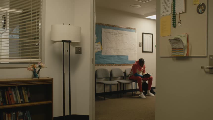 A student walks down the hallway