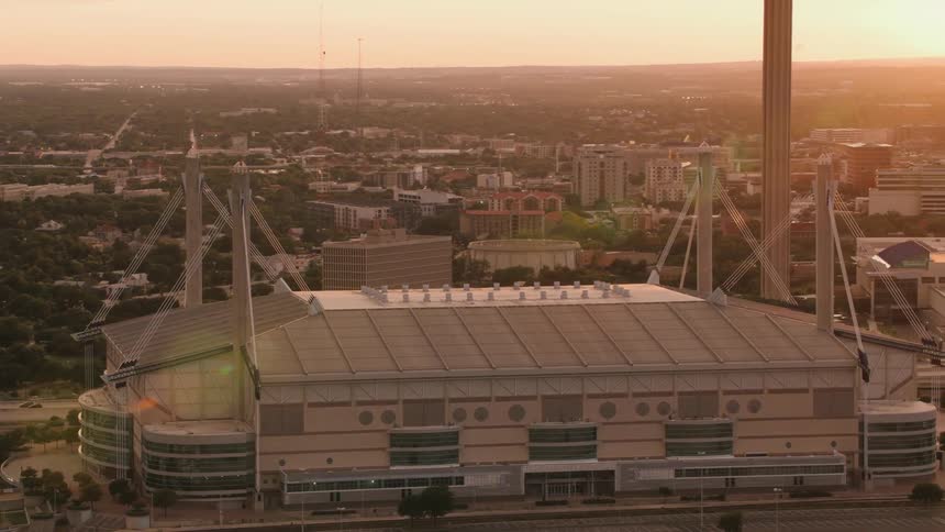 A large stadium is in the city