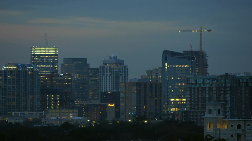 A city skyline with many tall buildings
