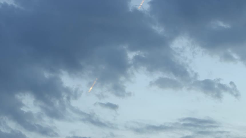 A skyline has heavy clouds