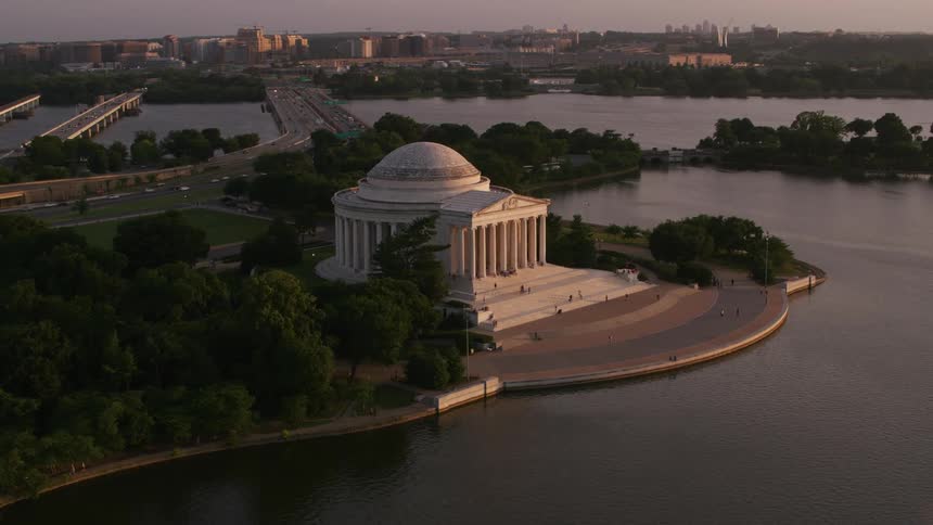 People walking on the steps and paths of the jefferson memorial