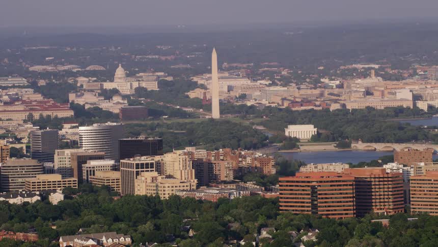 Aerial view of skyscrapers and buildings is displayed