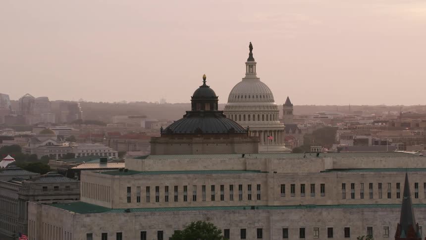 Aerial view of a government building in a downtown city