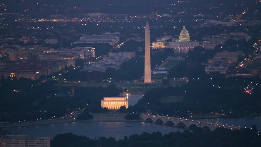 Heavy traffic passes over bridges by the us capitol