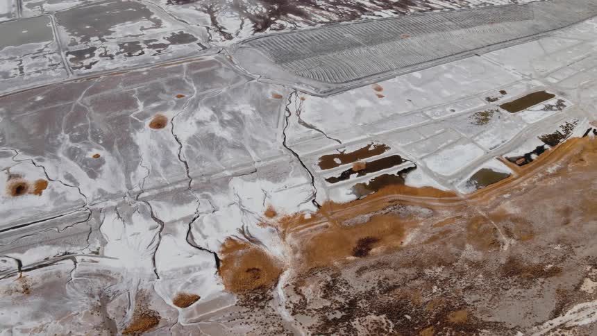Scars in a dry landscape caused by drought and chemical runoff