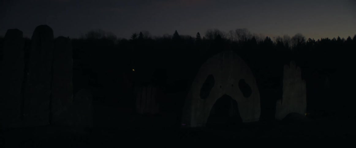 Lights reflect off the sculptures