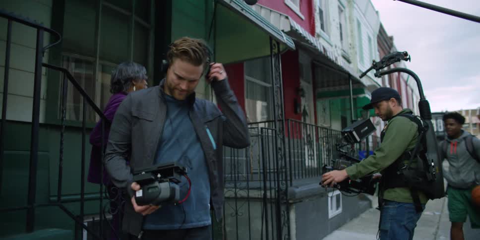 A camera crew on the road