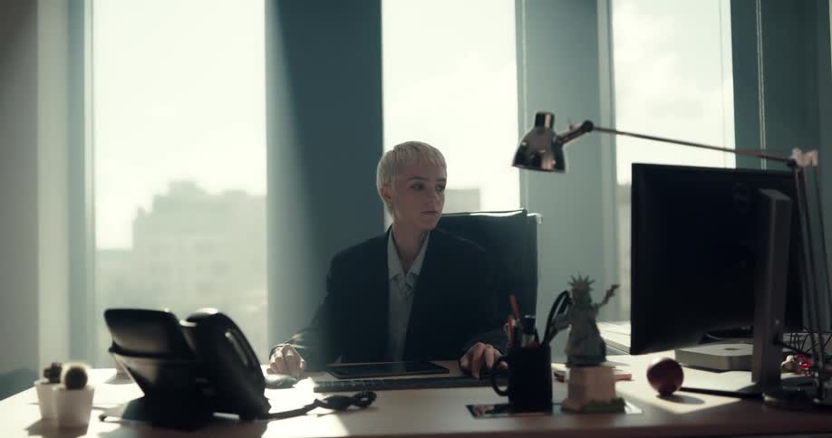 A female employee is working in her office