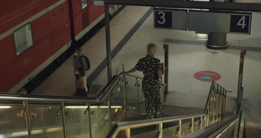 A woman running to a train