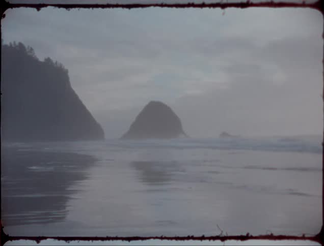 The tide washes onto a empty beach