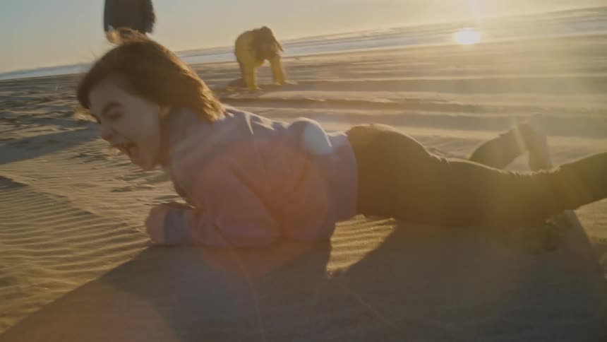 Children play on the beach