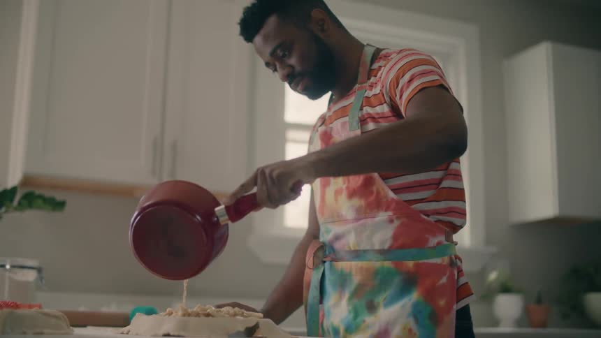 A man cooking in a kitchen