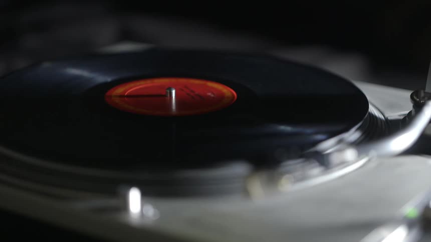 A turntable is spinning a record