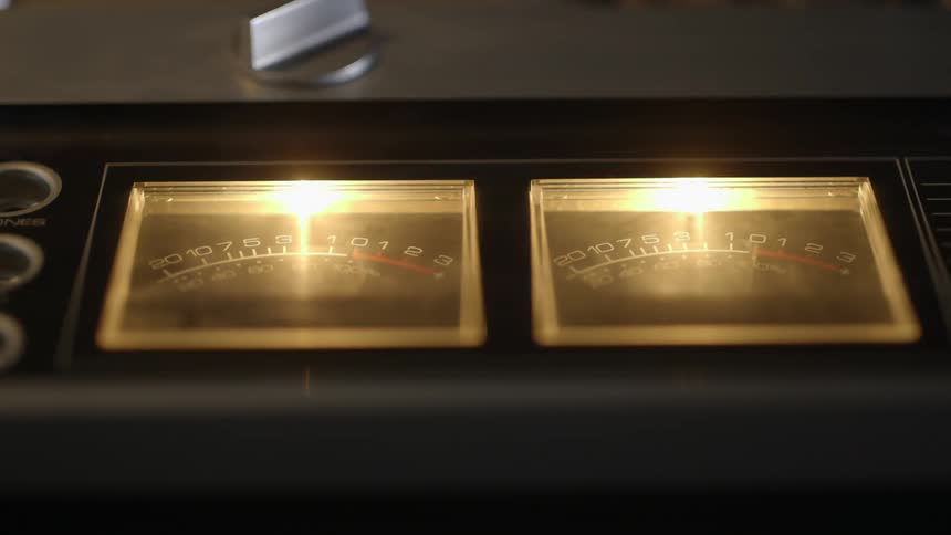 Two dials on a machine are moving