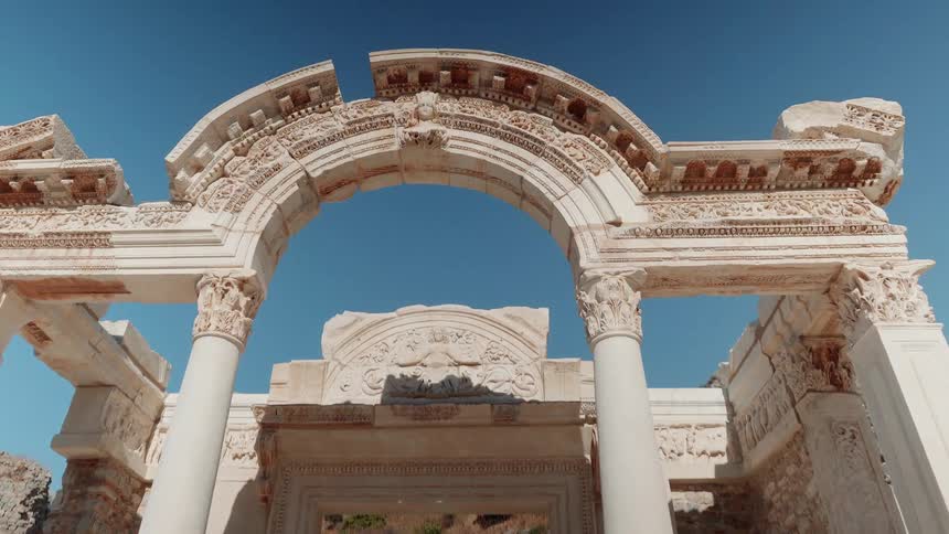 The arch and columns of the ancient temple of hadrian