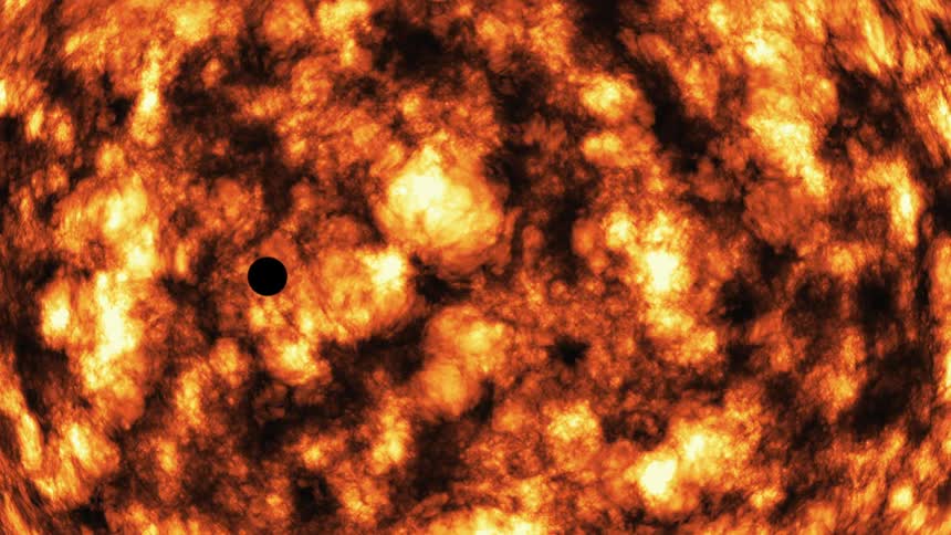 A view of a planet passing in front of the sun