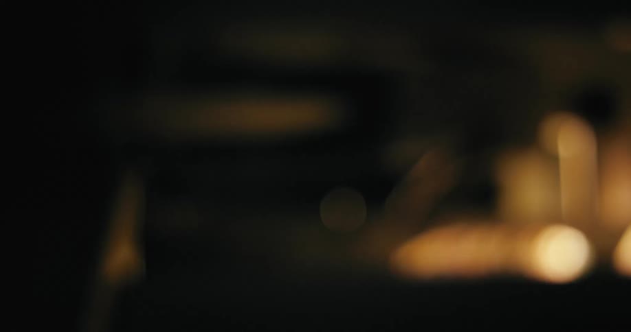 A man walking out a door