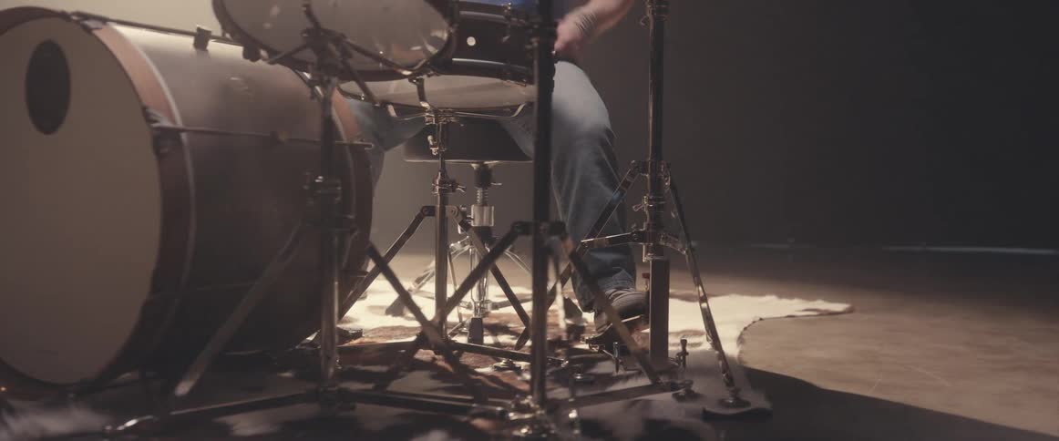 A man is playing the drums