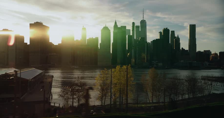 The sun is rising on the city