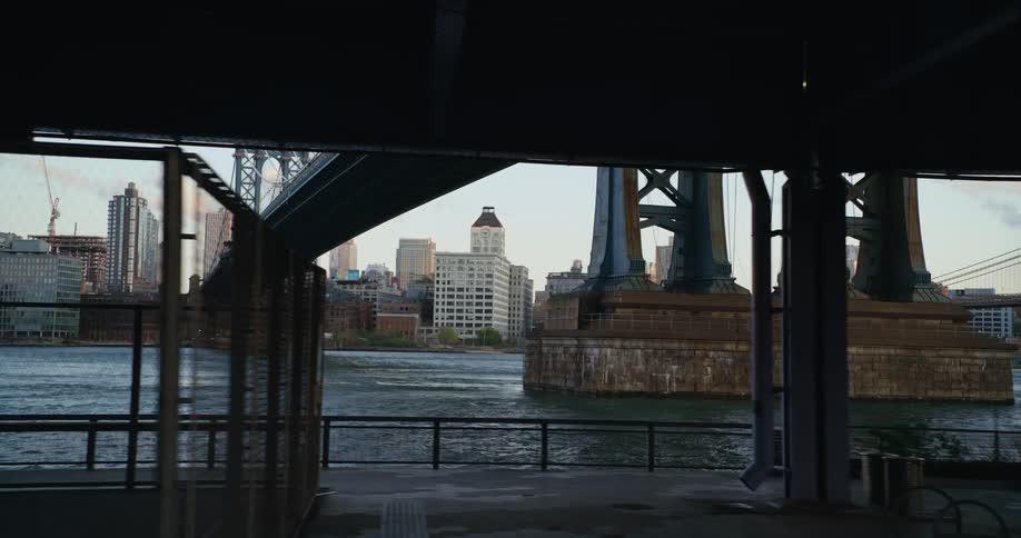 Traveling past the manhattan bridge in new york city