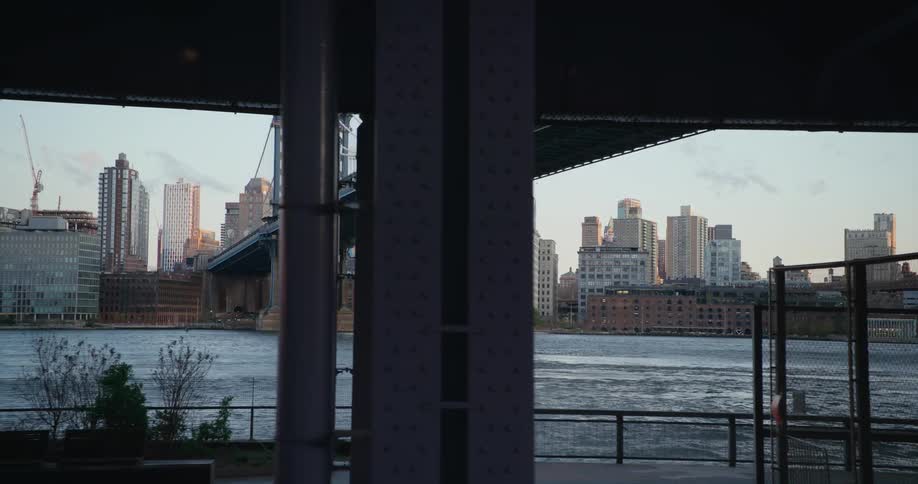 A large bridge leads to the city