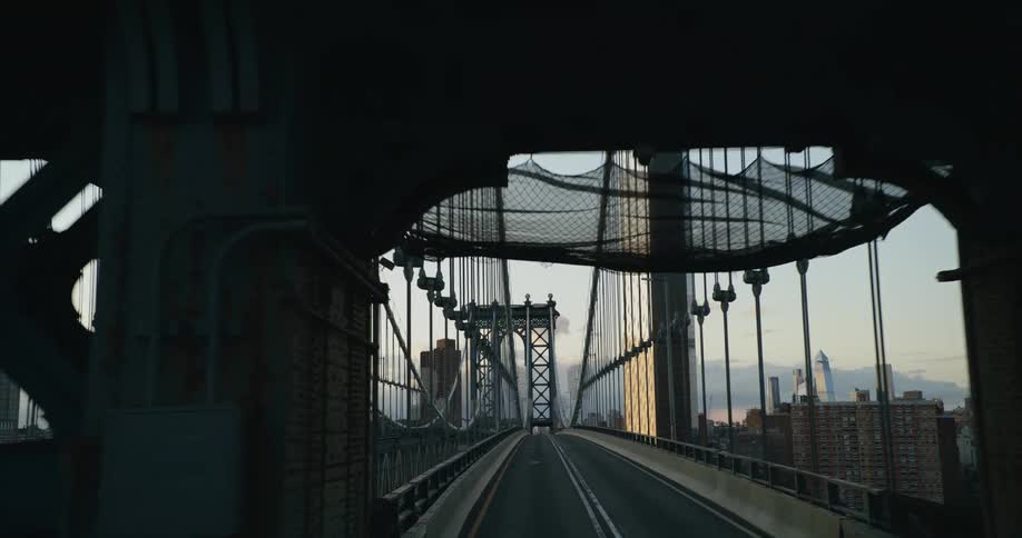 Vehicle crosses empty suspension bridge during lockdown