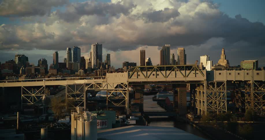 The bridge is before the large city