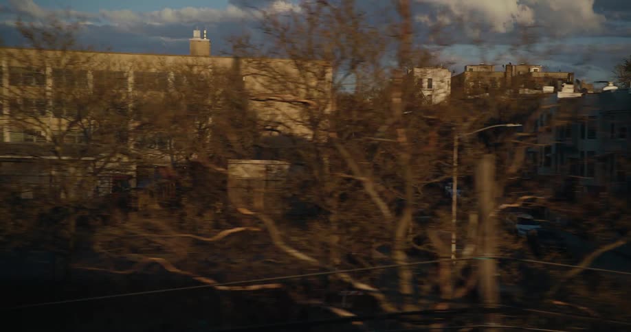 A view of a city neighborhood with multiple residential buildings