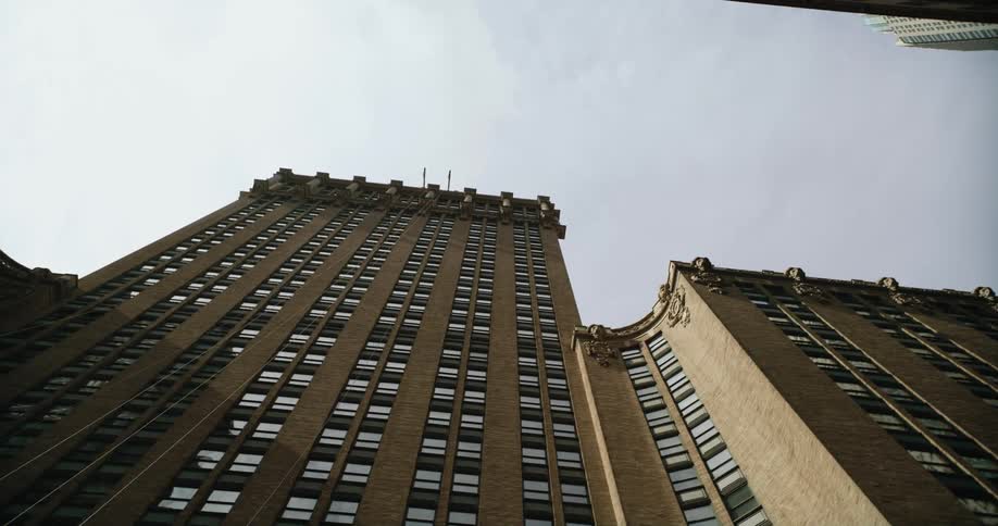 Traveling underneath a tall building in a city