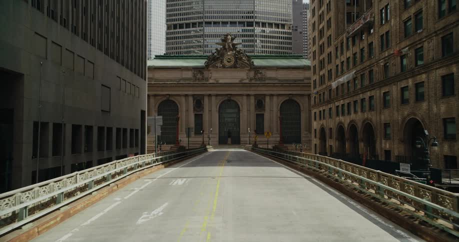 A bridge runs between office buildings downtown