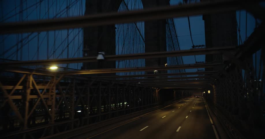 A large traffic bridge during the night