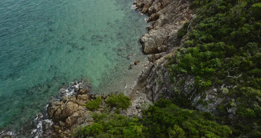 The waves splash against the shore