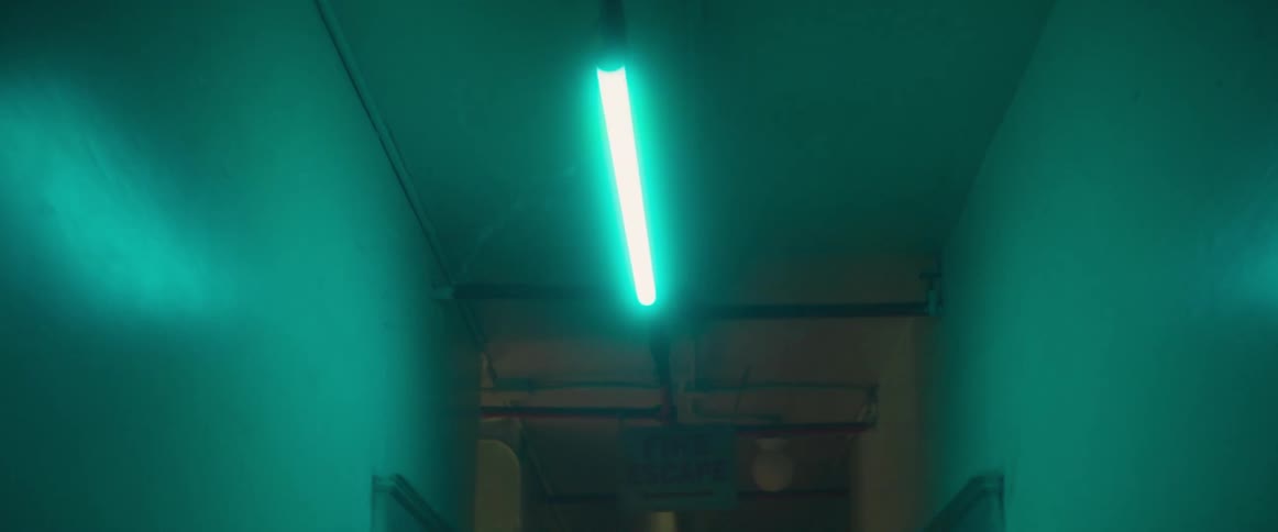 The inside of a buildings hallway is displayed