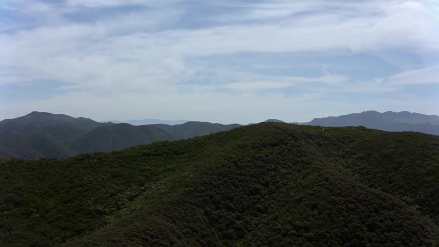 The mountains are covered with green