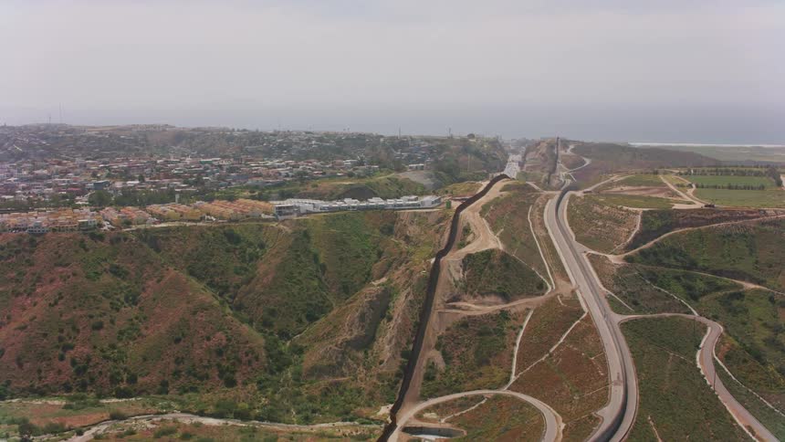 Aerial view of the border wall between Mexico and USA in Southern California
