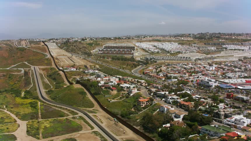 Aerial view of the border wall between Mexico and USA in Southern California