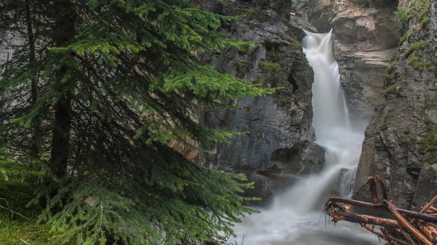 Time lapse of a stream going down a mountain side