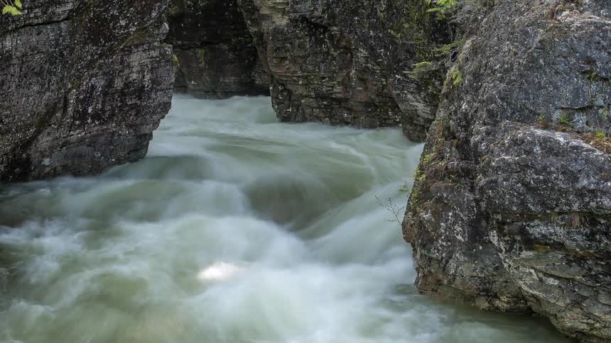 A fast moving brook through rocks