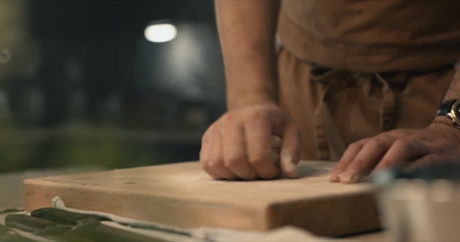 A person cooking dough