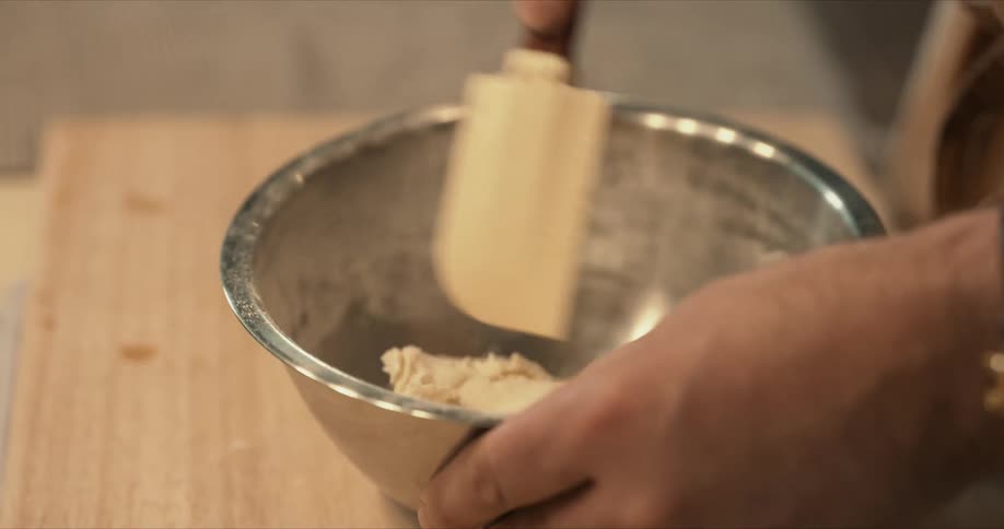 Person preparing dough