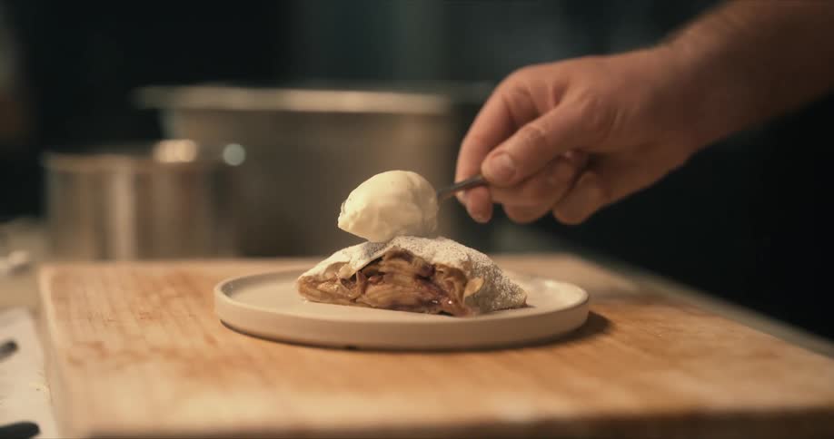 A chef is preparing a meal