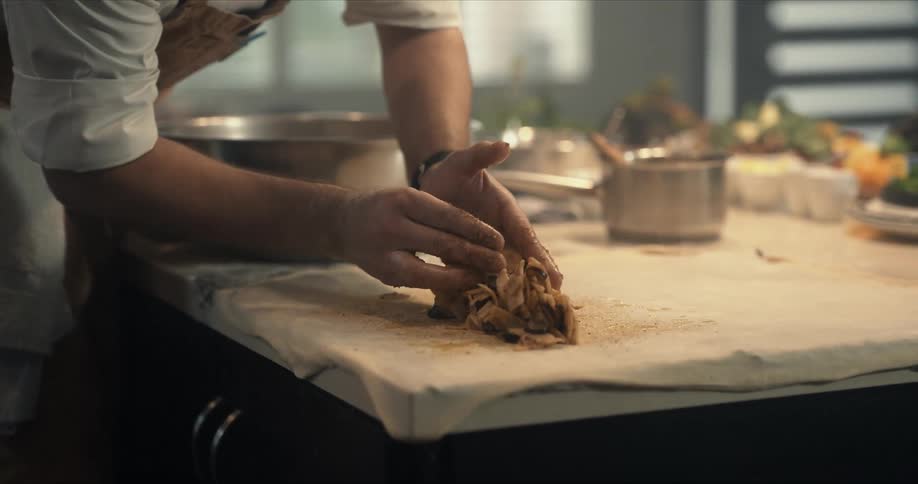 A chef is preparing food