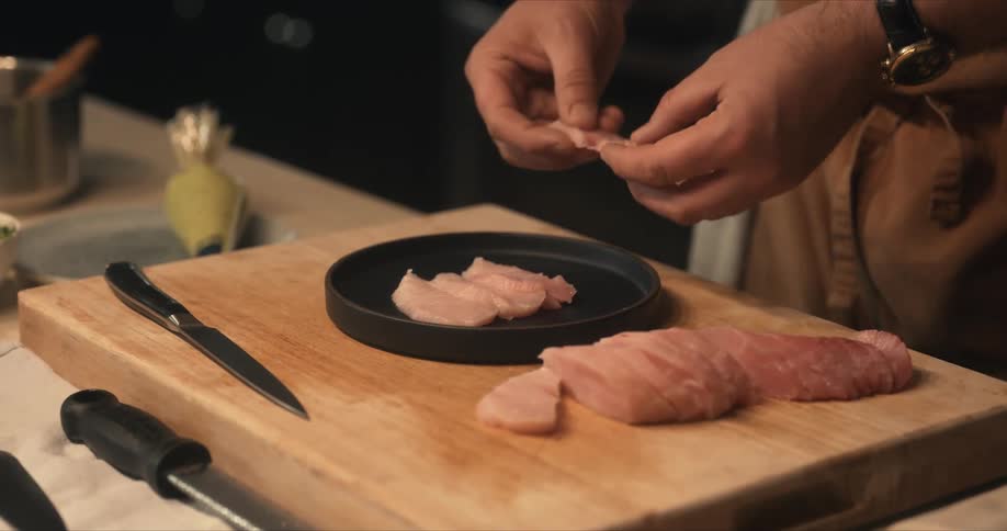 A view of a person making food