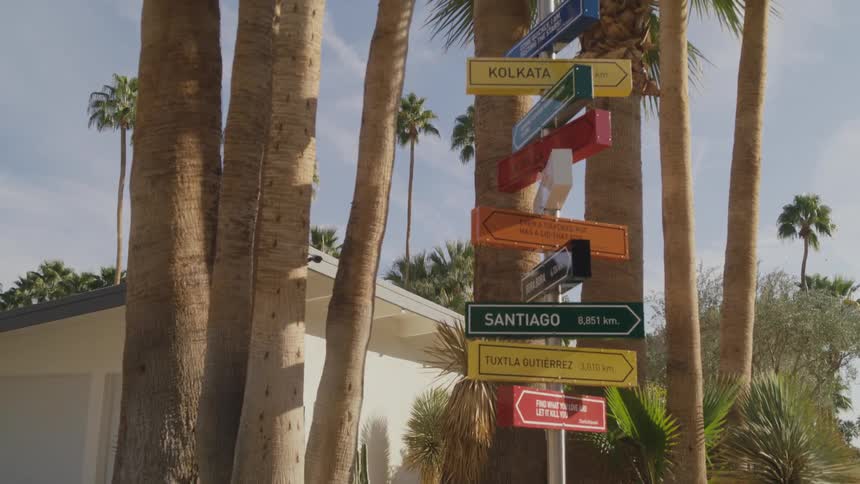 The pole has many signs on it