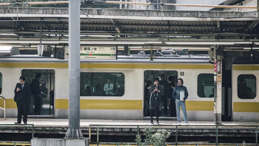 People are waiting for the subway at the terminal