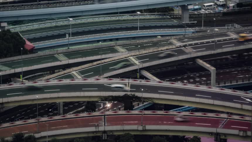 Traffic travels along the many overpasses of an elaborate interchange