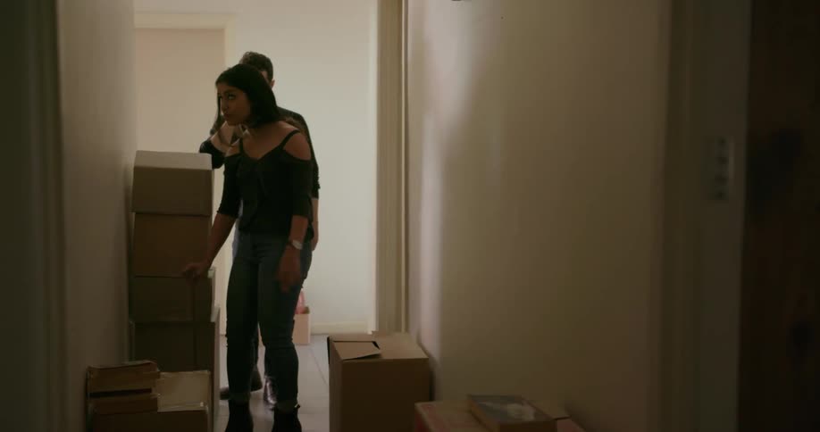 Man and woman move into a house
