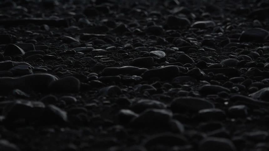 Close up of rocks in a dark area